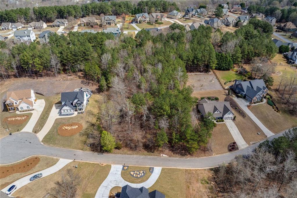 2661 Alexis Way Monroe, GA 30656 - Photo 6 of 12 an aerial view of a house with swimming pool