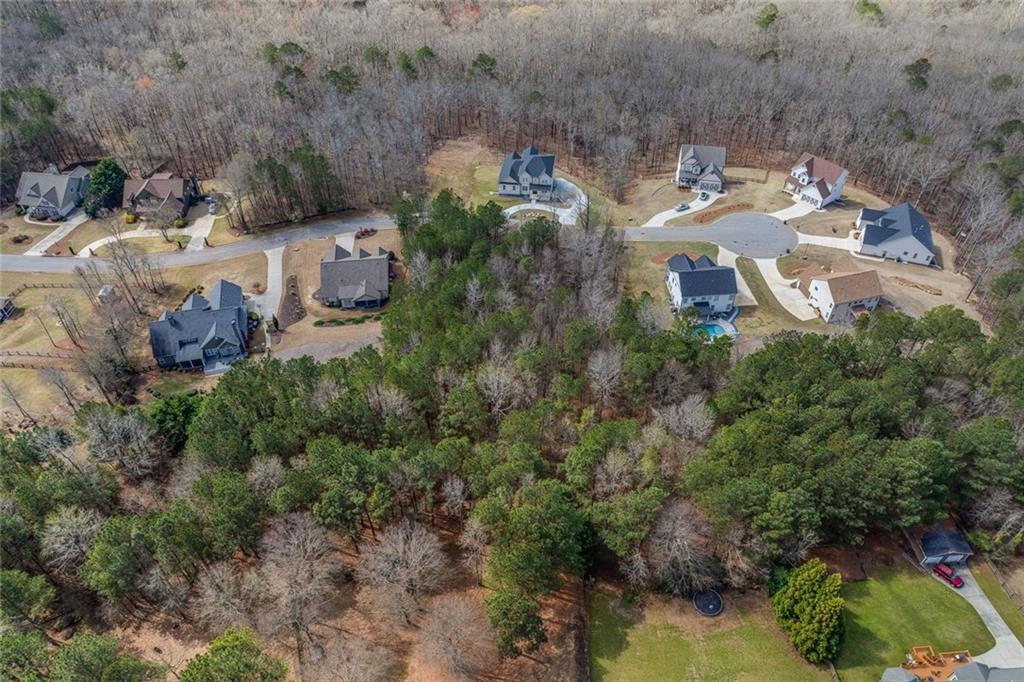 2661 Alexis Way Monroe, GA 30656 - Photo 8 of 12 an aerial view of a house with a yard