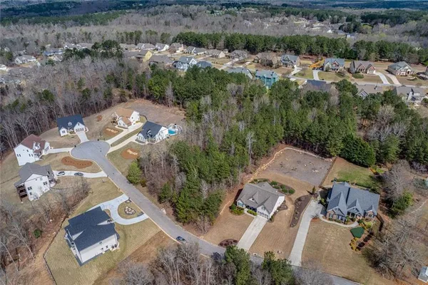 an aerial view of residential house with outdoor space