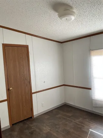 an empty room with window