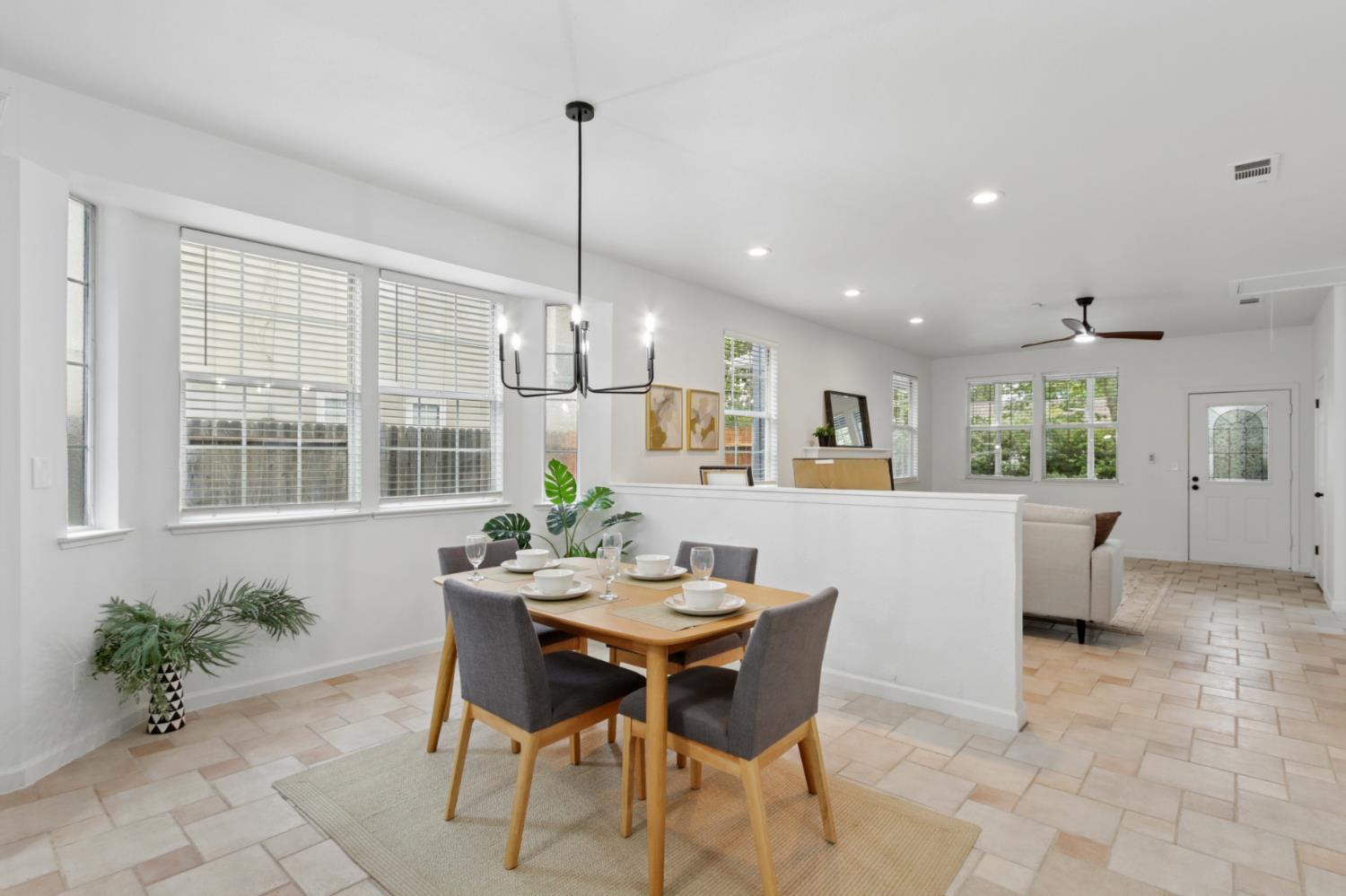 225 Creekside Way Winters, CA 95694 - Photo 16 of 56 a dining room with furniture and window