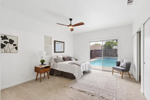 a bedroom with a bed and a walk in closet