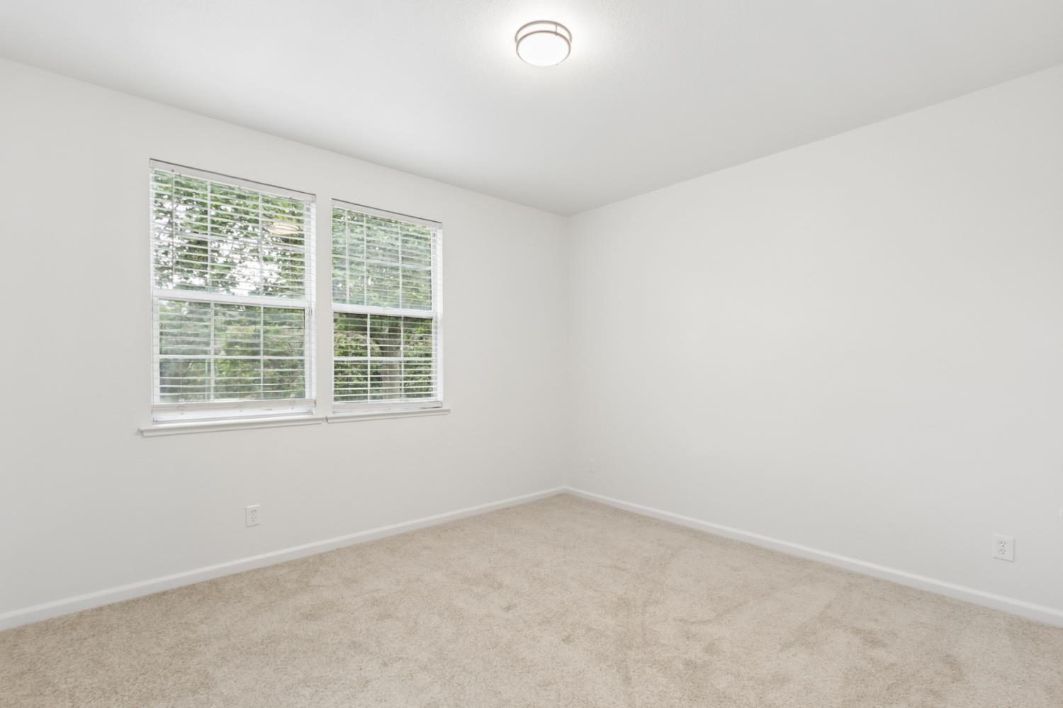 225 Creekside Way Winters, CA 95694 - Photo 37 of 56 an empty room with a window