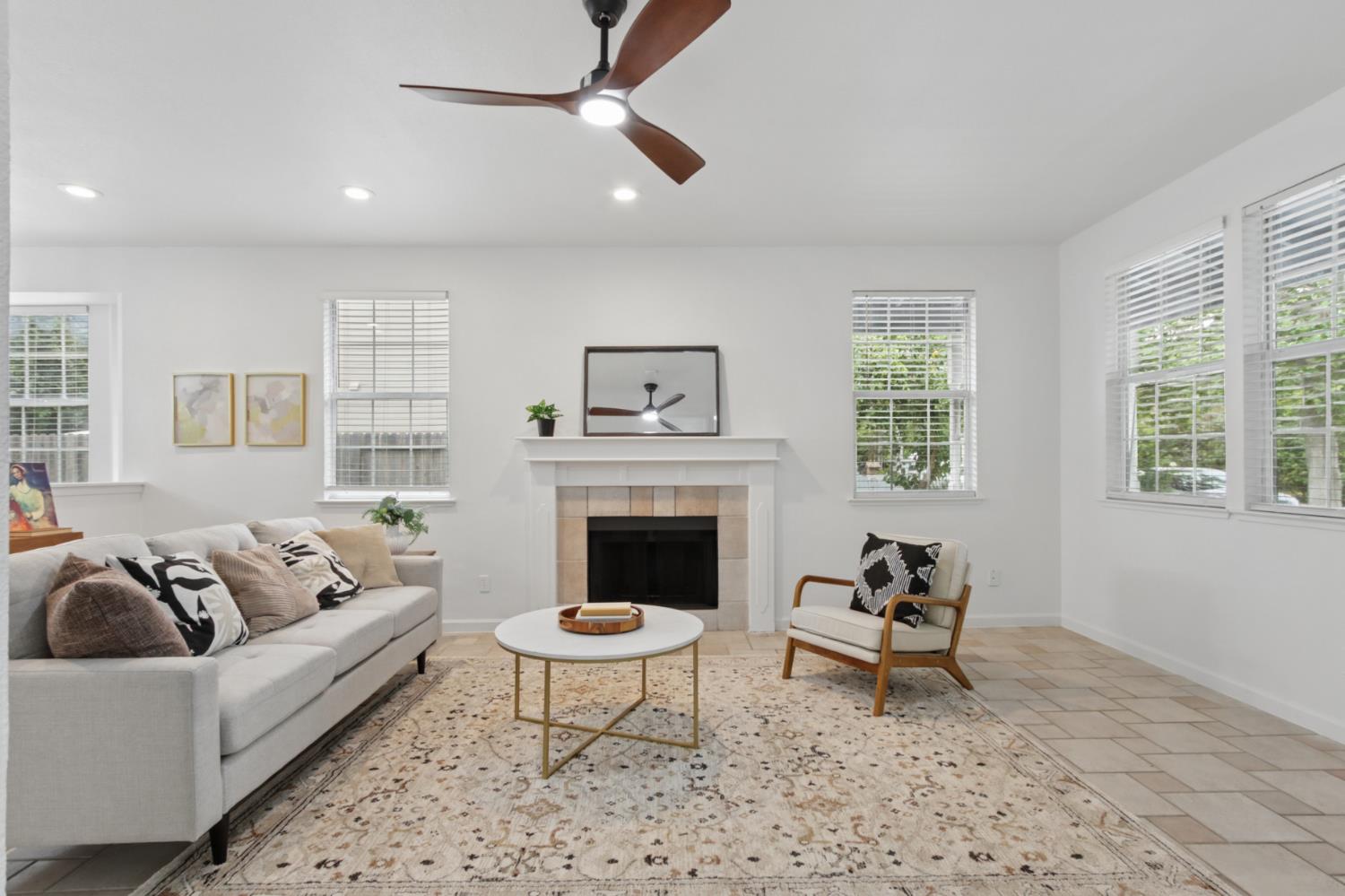 225 Creekside Way Winters, CA 95694 - Photo 5 of 56 a living room with furniture and a fireplace