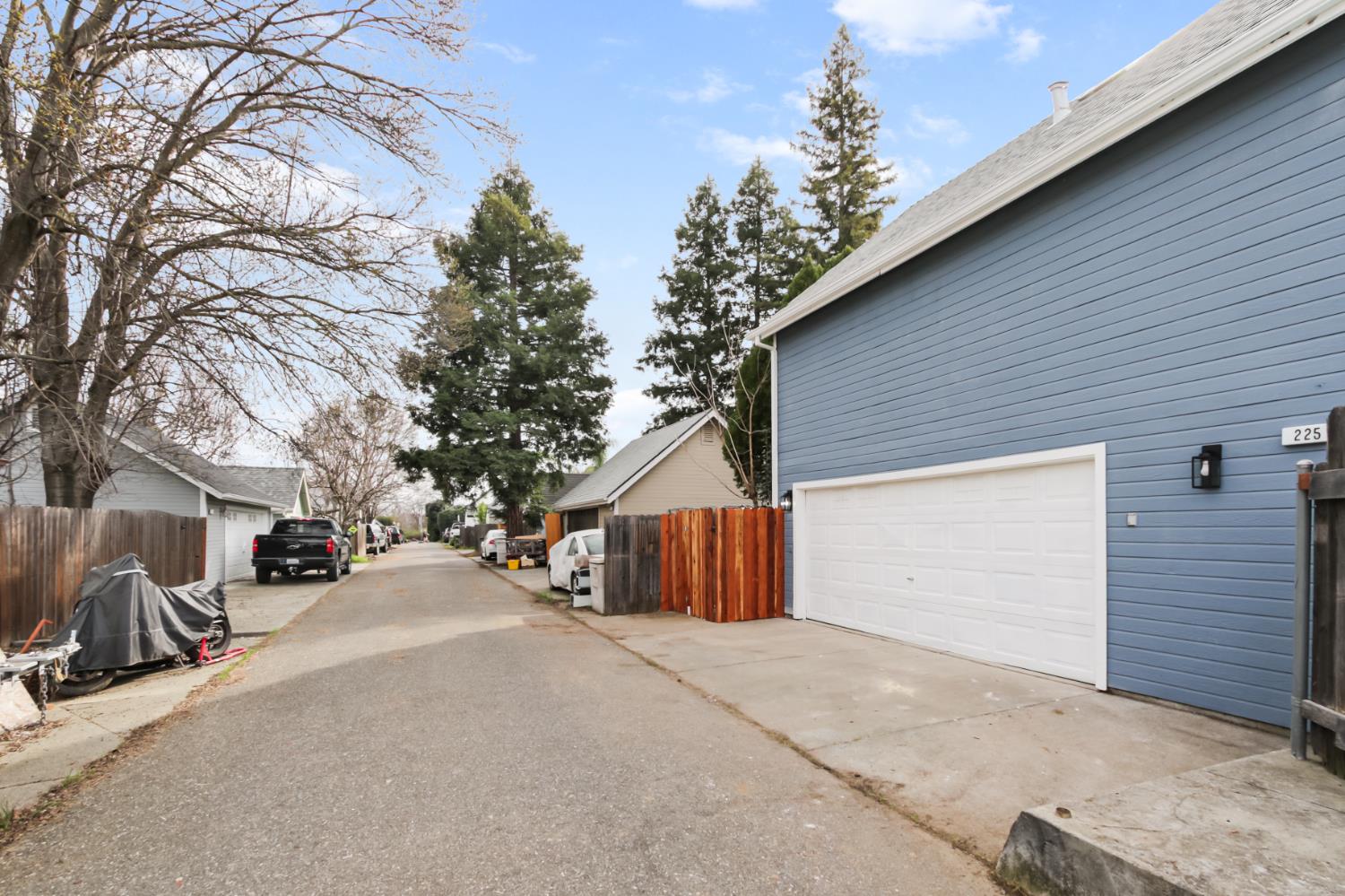 225 Creekside Way Winters, CA 95694 - Photo 54 of 56 a view of a house with a yard and garage