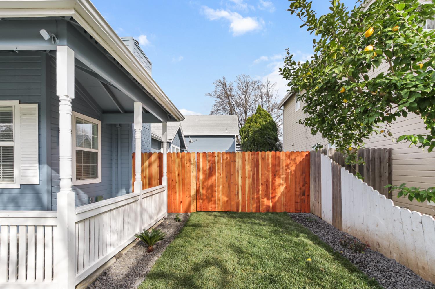 225 Creekside Way Winters, CA 95694 - Photo 55 of 56 a view of backyard with small cabin and wooden fence