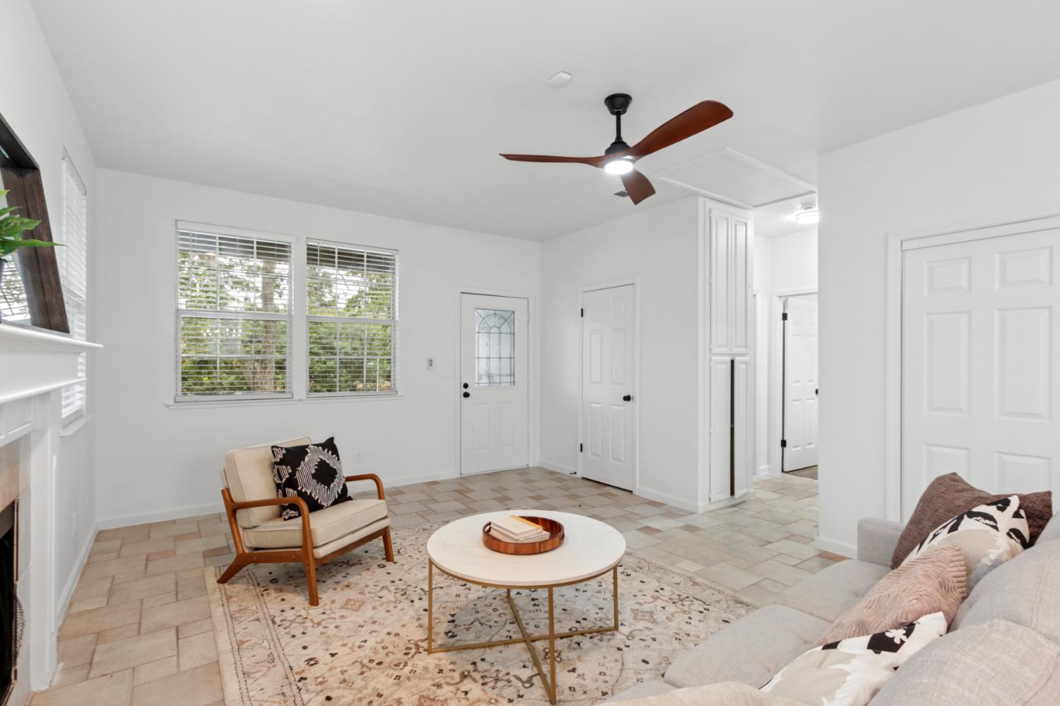 225 Creekside Way Winters, CA 95694 - Photo 6 of 56 a living room with furniture and a large window