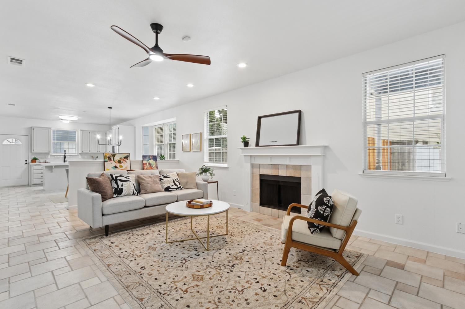 225 Creekside Way Winters, CA 95694 - Photo 7 of 56 a living room with furniture and a fireplace