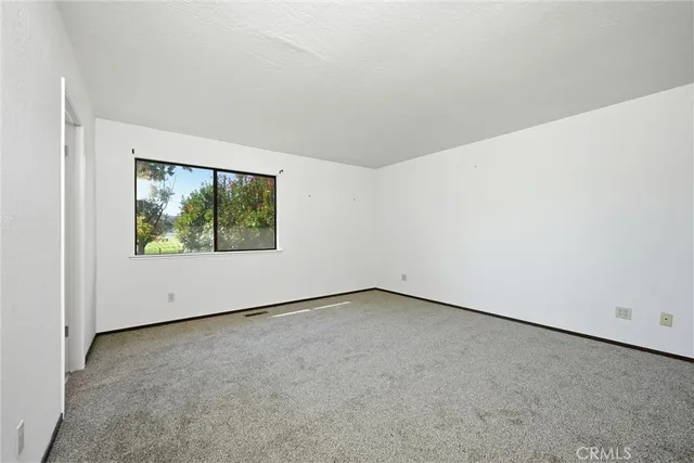 an empty room with window