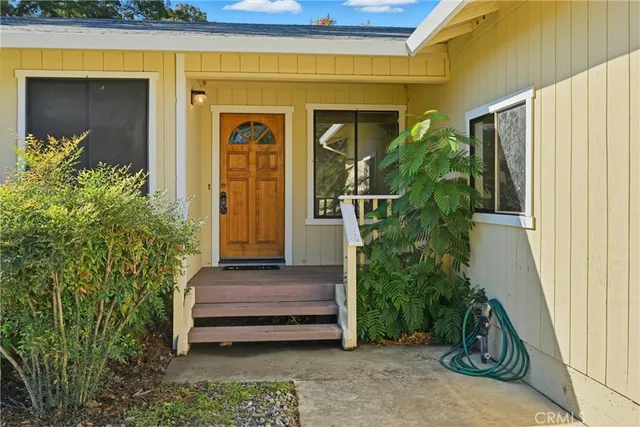 a house view with a garden space