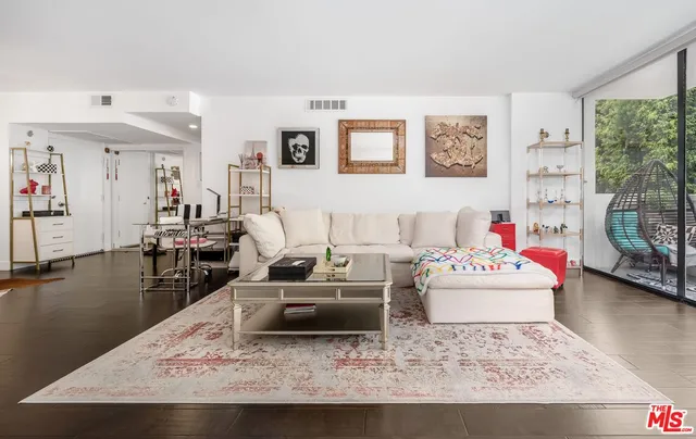 a kitchen with a sink and a stove top oven