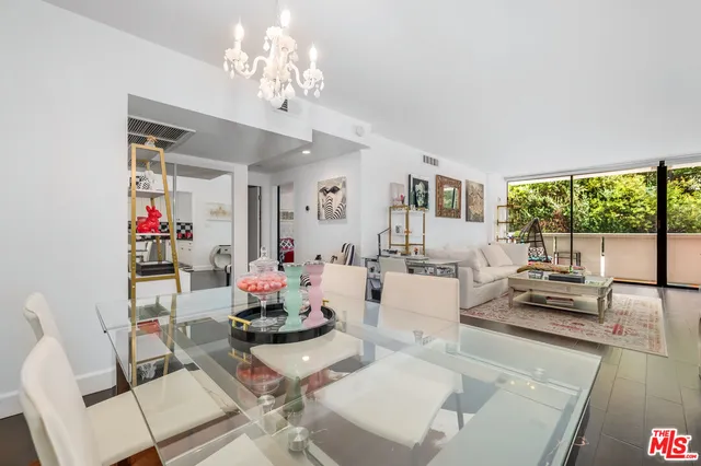 a very nice looking living room with furniture and wooden floor