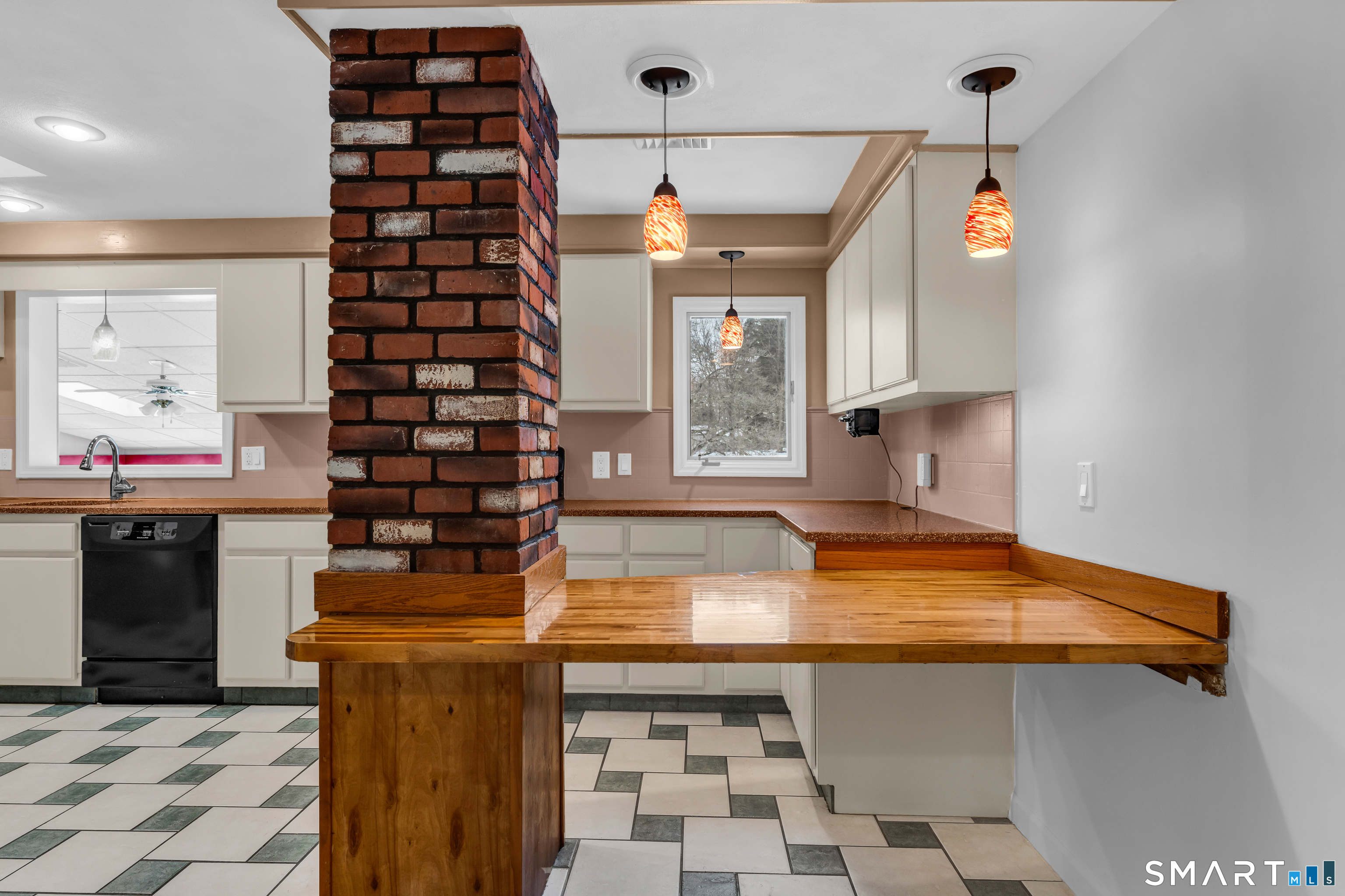 204 Parker Farms Road Wallingford, CT 06492 - Photo 13 of 39 a view of a kitchen with a sink and cabinets