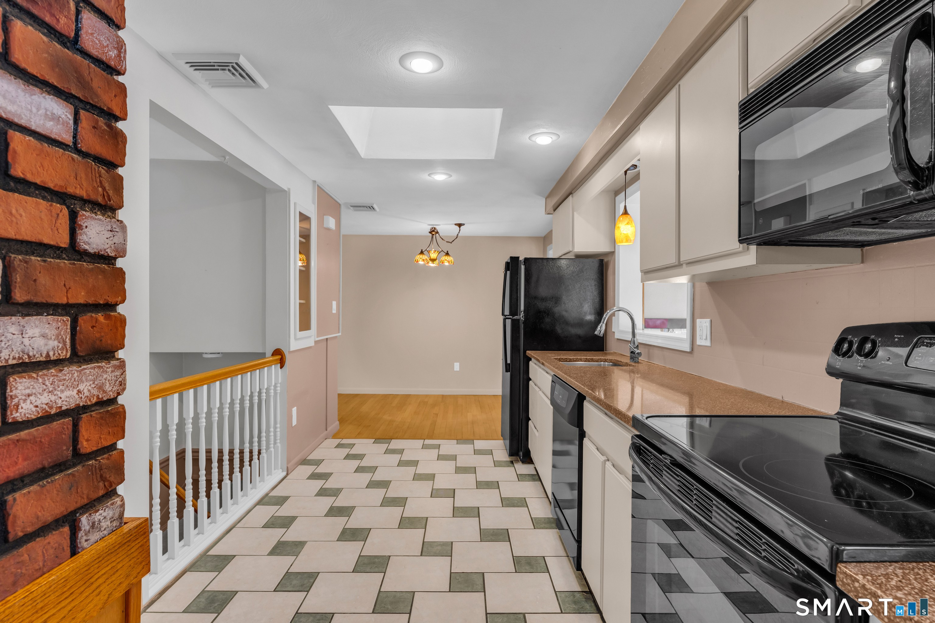 204 Parker Farms Road Wallingford, CT 06492 - Photo 16 of 39 a kitchen with stainless steel appliances granite countertop a refrigerator and a stove top oven