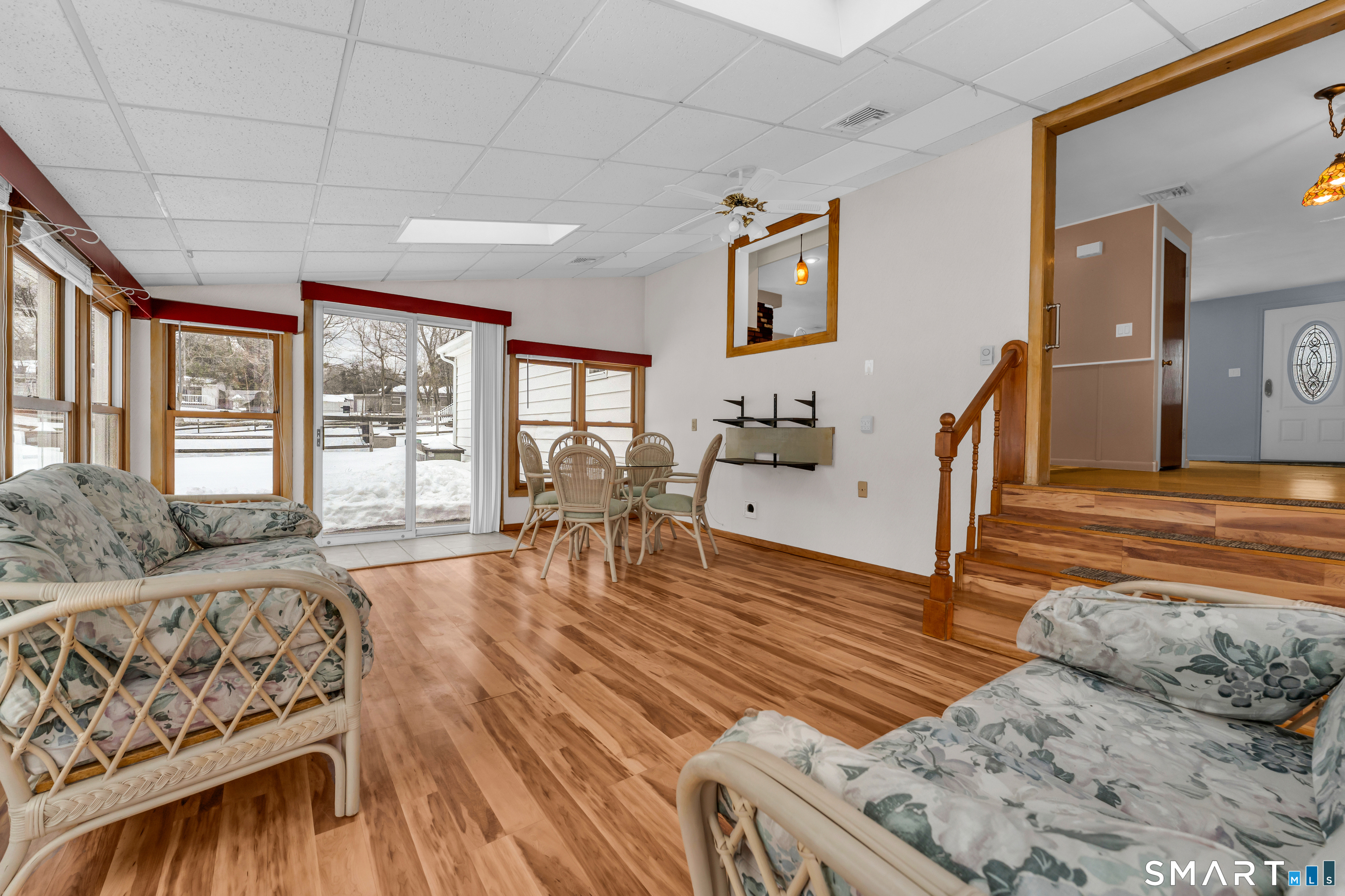 204 Parker Farms Road Wallingford, CT 06492 - Photo 20 of 39 a living room with furniture and a wooden floor