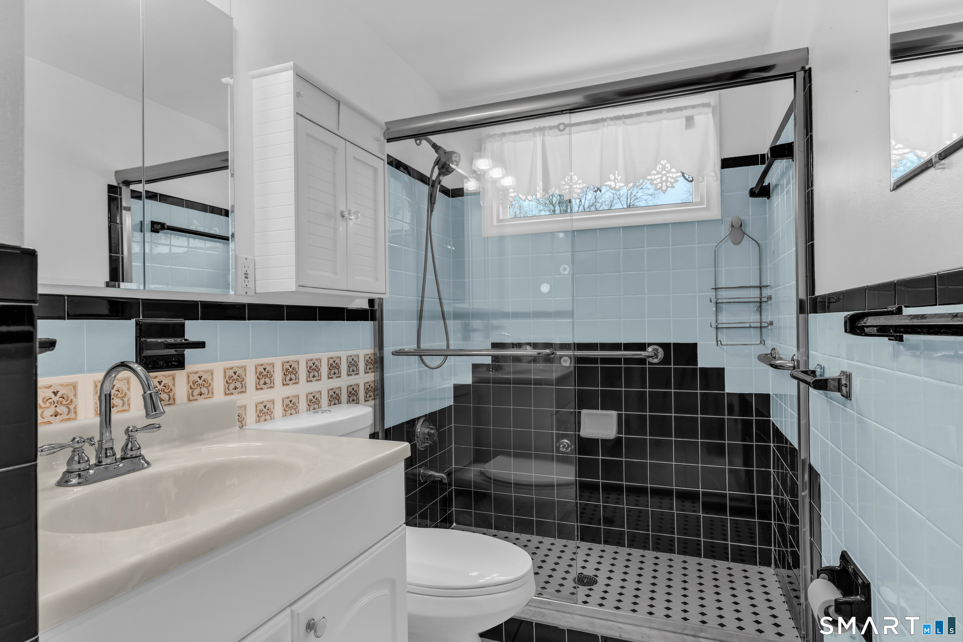 204 Parker Farms Road Wallingford, CT 06492 - Photo 22 of 39 a bathroom with a sink a toilet and shower