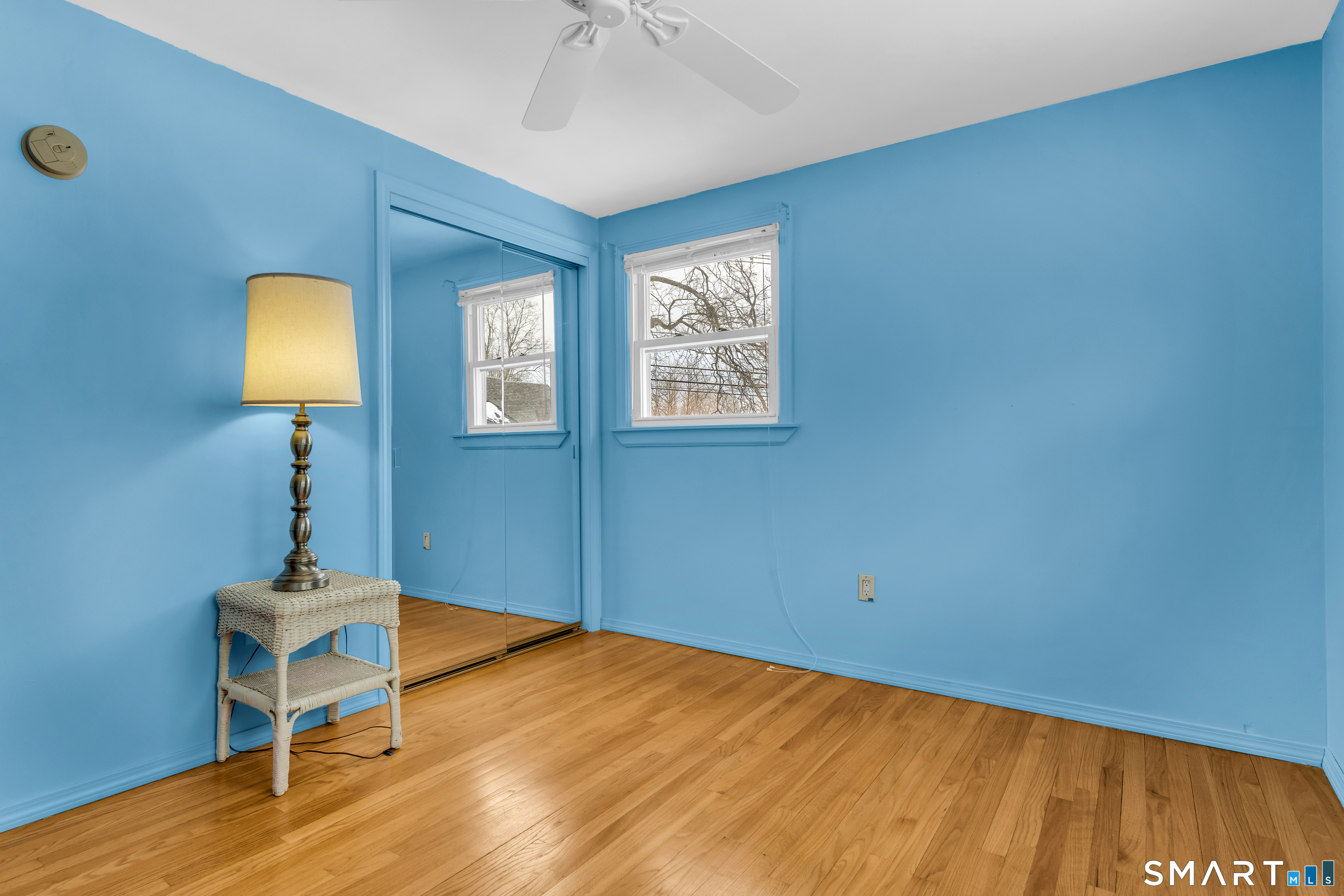 204 Parker Farms Road Wallingford, CT 06492 - Photo 29 of 39 a room with a wooden floor and a table