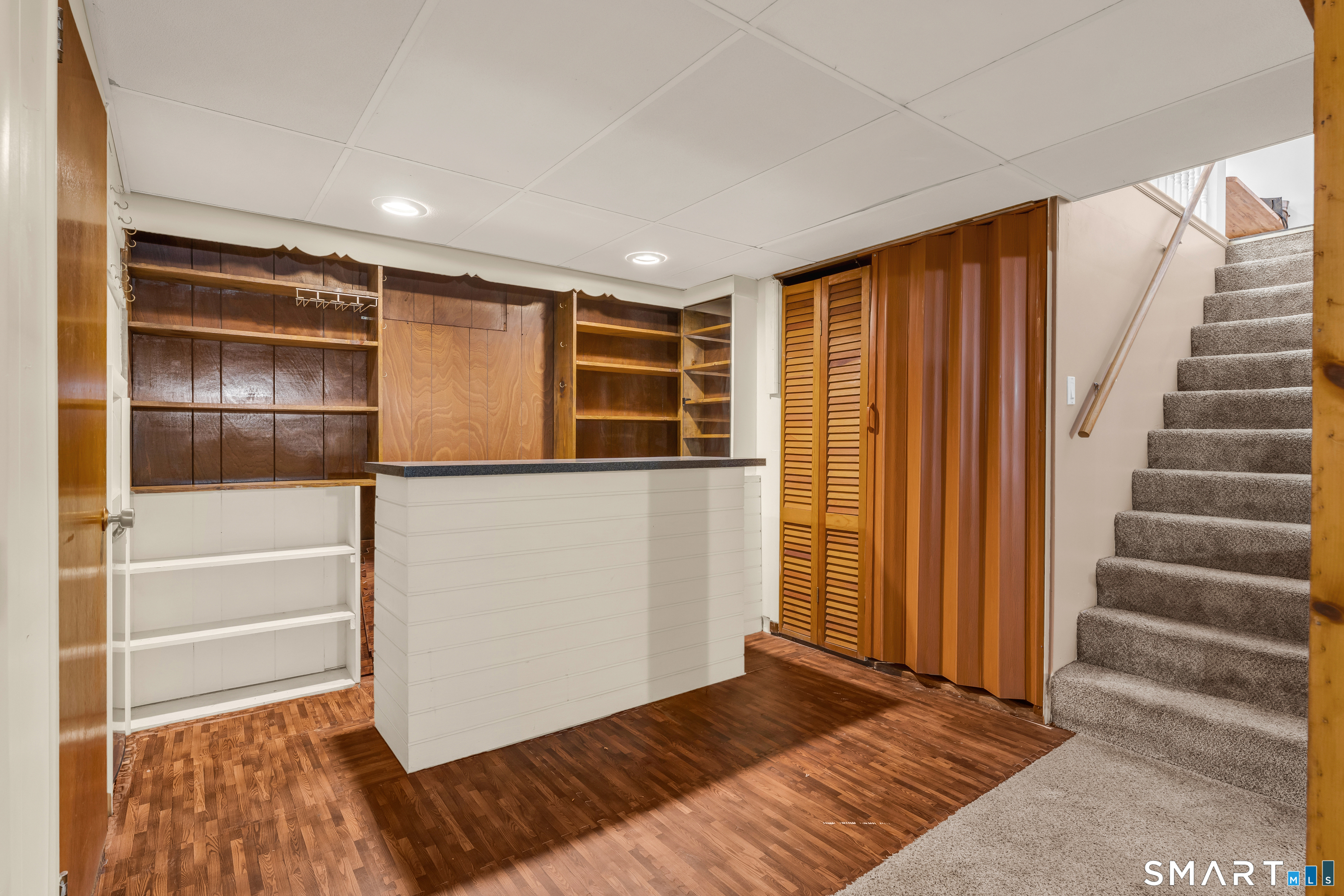 204 Parker Farms Road Wallingford, CT 06492 - Photo 32 of 39 a view of an empty room with stairs and ventilation