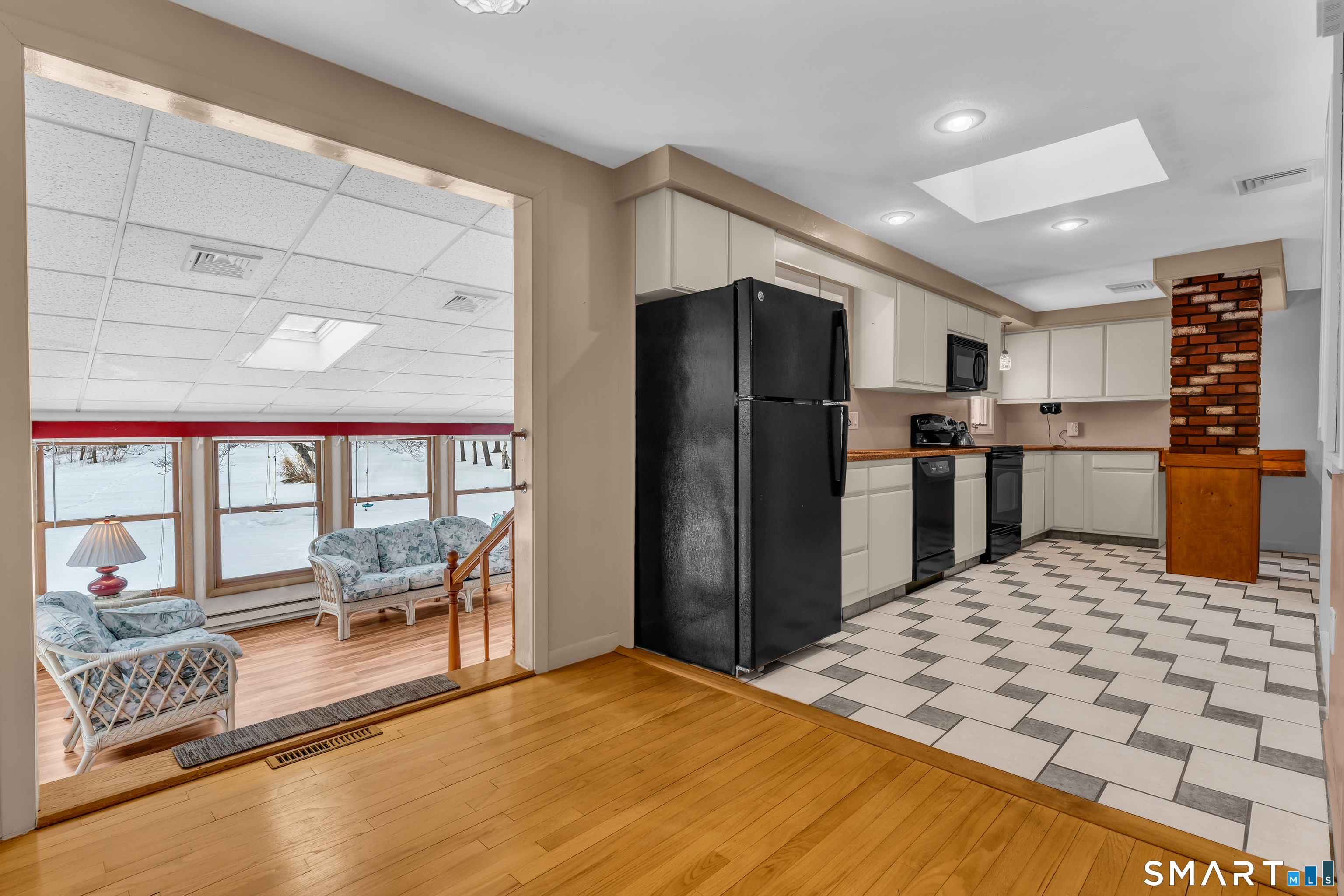 204 Parker Farms Road Wallingford, CT 06492 - Photo 8 of 39 a kitchen with stainless steel appliances kitchen island granite countertop a refrigerator and a sink