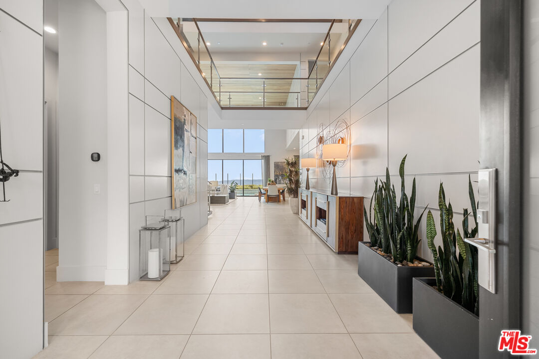 20378 Marlow Lane Porter Ranch, CA 91326 - Photo 45 of 52 a hallway with a white stove next to a window