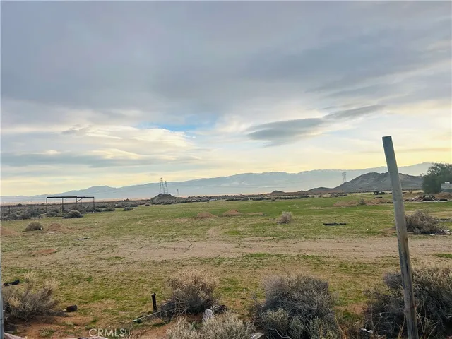 a view of an ocean and a mountain
