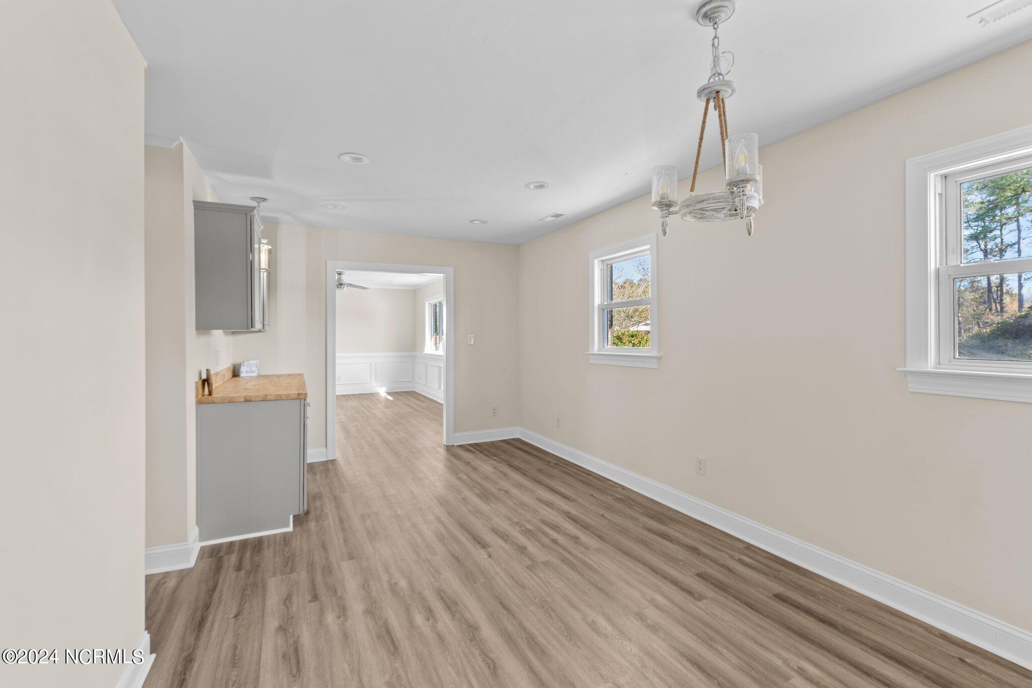 202 North 1st Avenue New Bern, NC 28560 - Photo 10 of 27 Formal Dining Room and Wet Bar