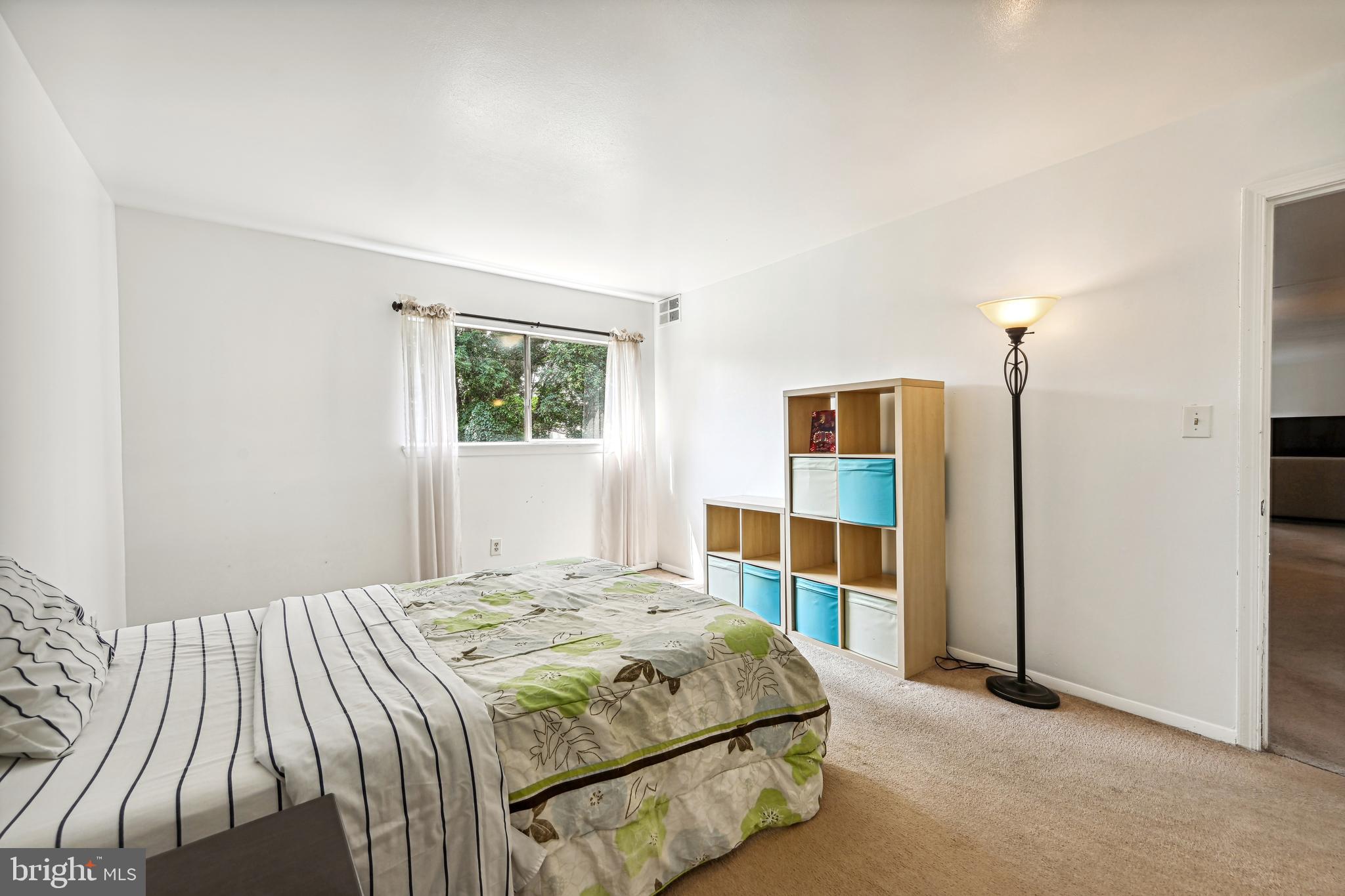 7507 Riverdale Road, Unit 2058 New Carrollton, MD 20784 - Photo 11 of 17 Primary Bedroom