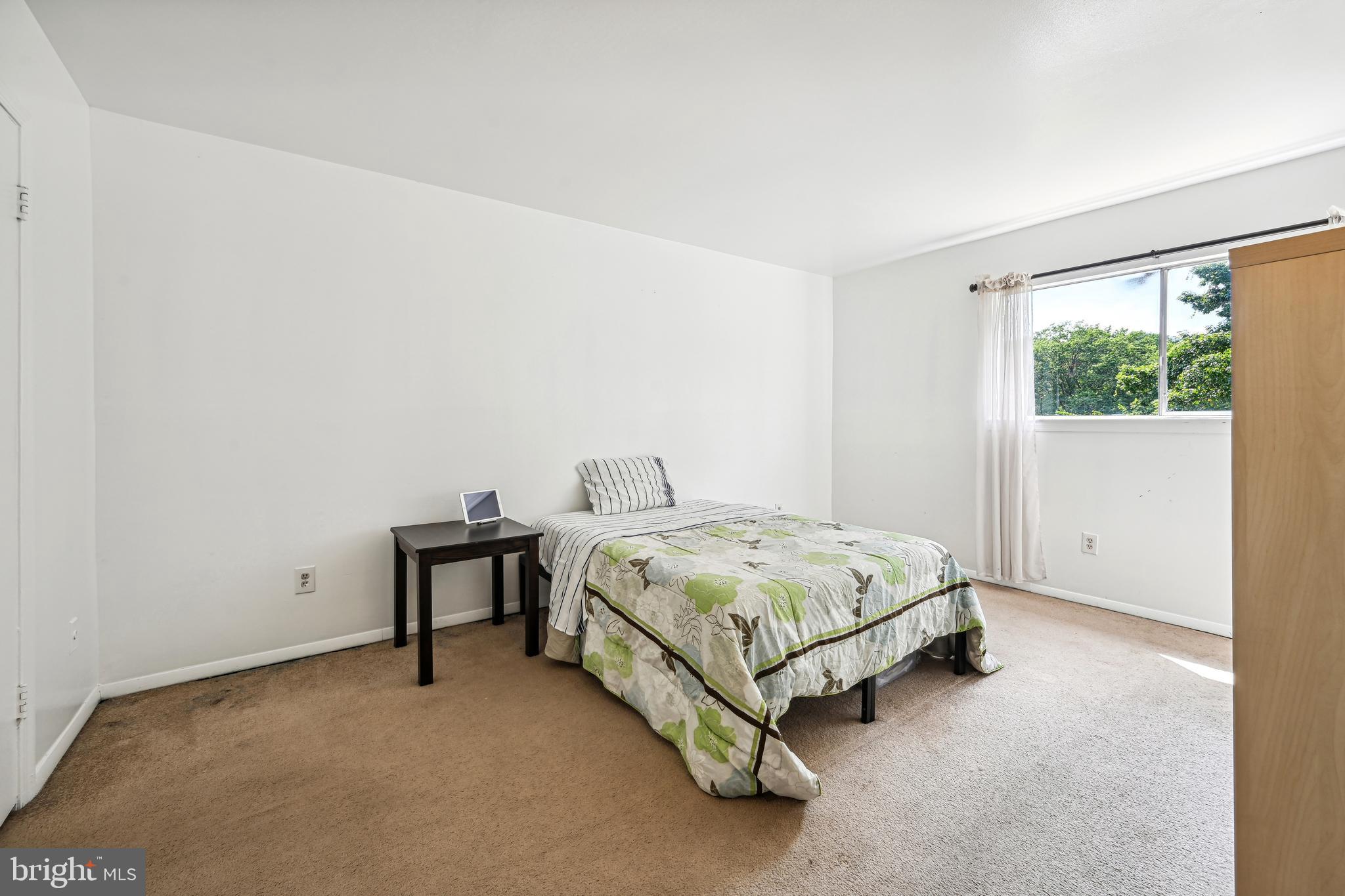 7507 Riverdale Road, Unit 2058 New Carrollton, MD 20784 - Photo 10 of 17 Primary Bedroom