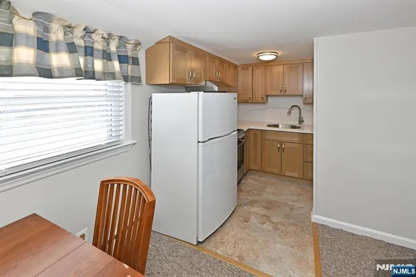 a bathroom with a toilet and shower
