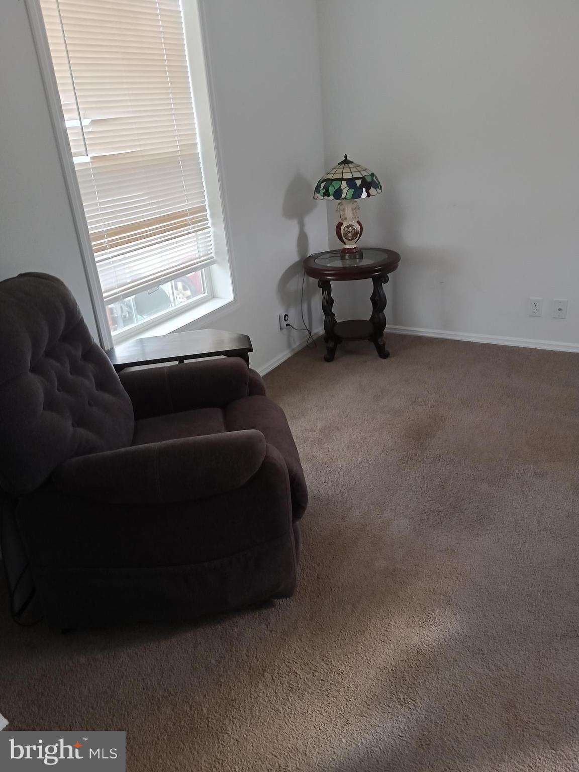 1405 Farrell Avenue, Unit 325 Cherry Hill, NJ 08002 - Photo 4 of 15 a living room with furniture and a window
