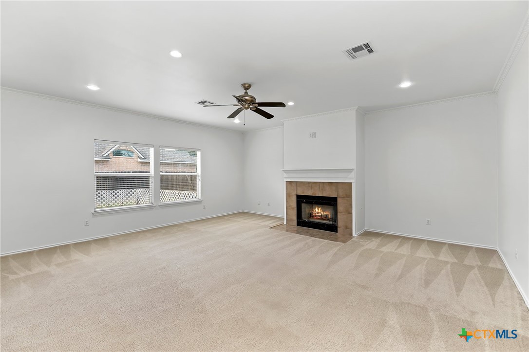 6700 Tulloch Way Austin, TX 78754 - Photo 19 of 41 a view of an empty room with a fireplace