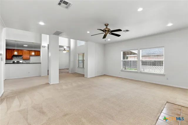 a view of a room with racks on the wall