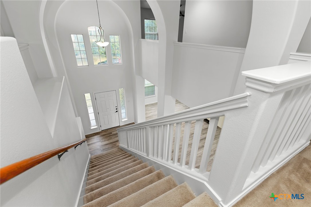 6700 Tulloch Way Austin, TX 78754 - Photo 24 of 41 a view of entryway and hall with wooden floor