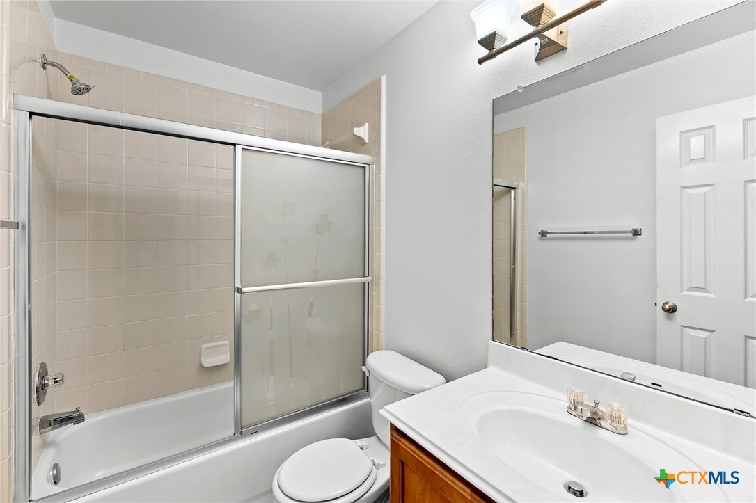 6700 Tulloch Way Austin, TX 78754 - Photo 37 of 41 a bathroom with a sink toilet and shower