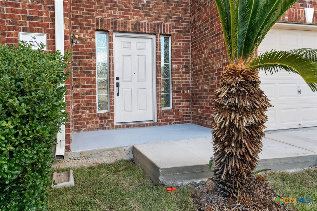 6700 Tulloch Way Austin, TX 78754 - Photo 5 of 41 a front view of a house with a yard