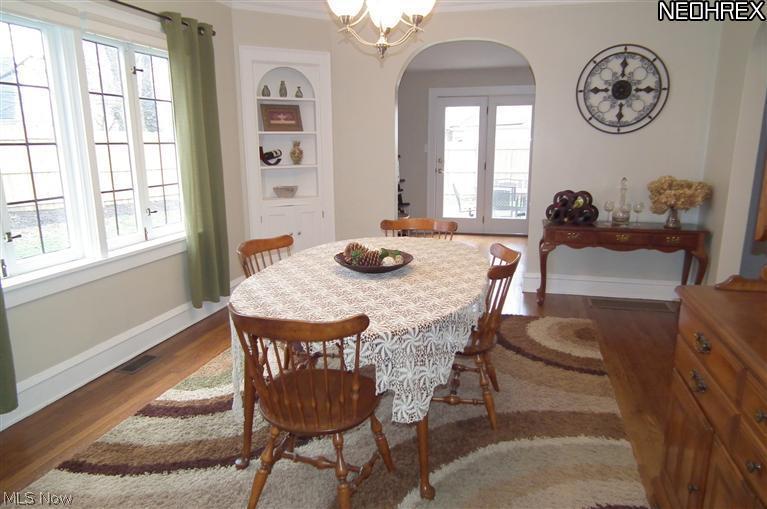 3387 Ingleside Road Shaker Heights, OH 44122 - Photo 7 of 16 DINING ROOM WITH BUILT INS AND HARDWOOD FLOORS