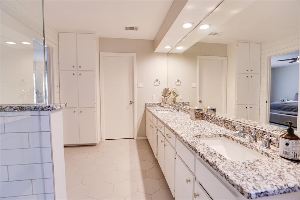 54 Legend Road Benbrook, TX 76132 - Photo 12 of 23 a bathroom with a granite countertop double vanity sink and mirror