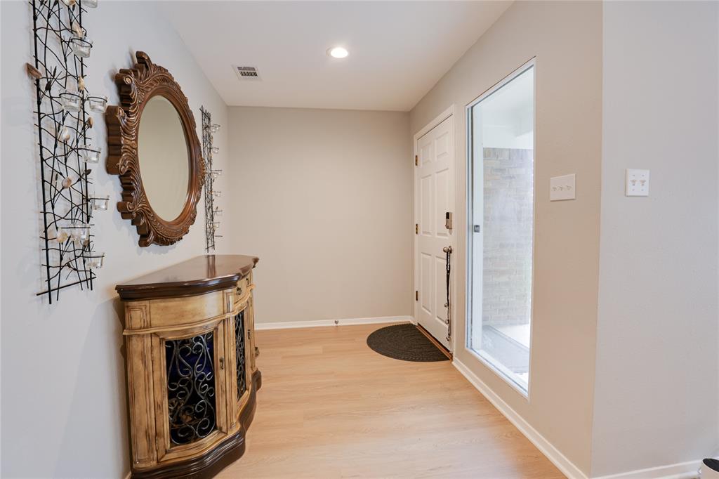 54 Legend Road Benbrook, TX 76132 - Photo 4 of 23 a bathroom with a sink and a mirror