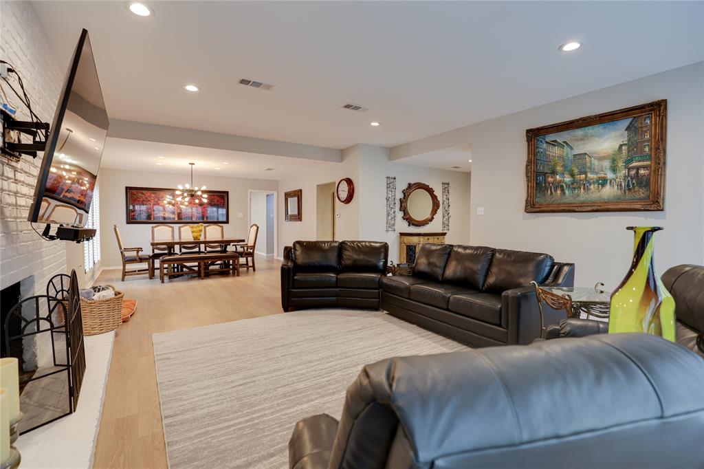 54 Legend Road Benbrook, TX 76132 - Photo 5 of 23 a living room with furniture and a flat screen tv