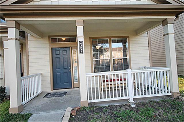23823 Single Oak Street Spring, TX 77373 - Photo 2 of 9 Cute front porch perfect for cool mornings with coffee or visiting with neighbors in the evening!