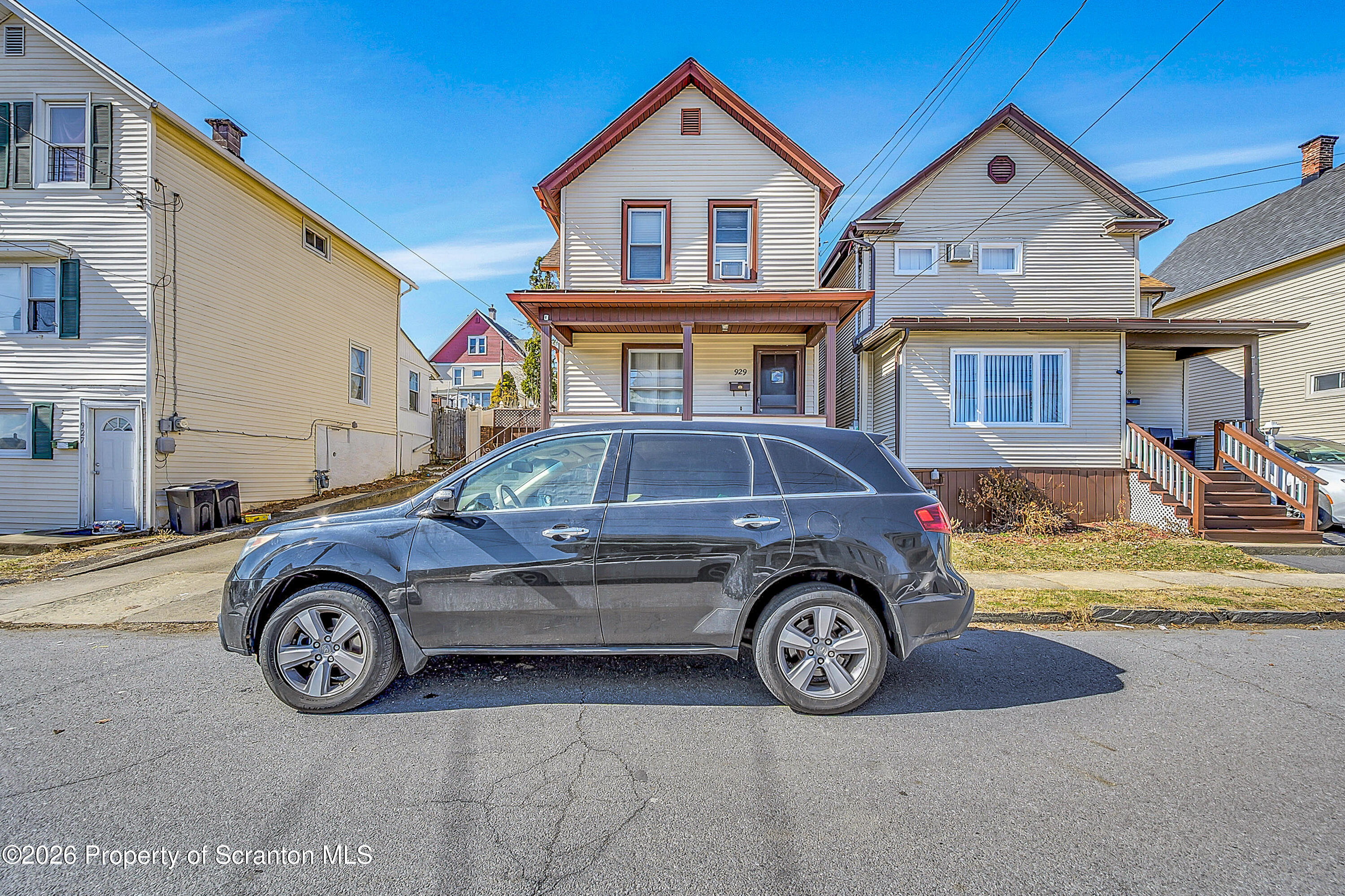 929 Ridge Avenue Scranton, PA 18510 - Photo 2 of 33 a front view of a house with parking space