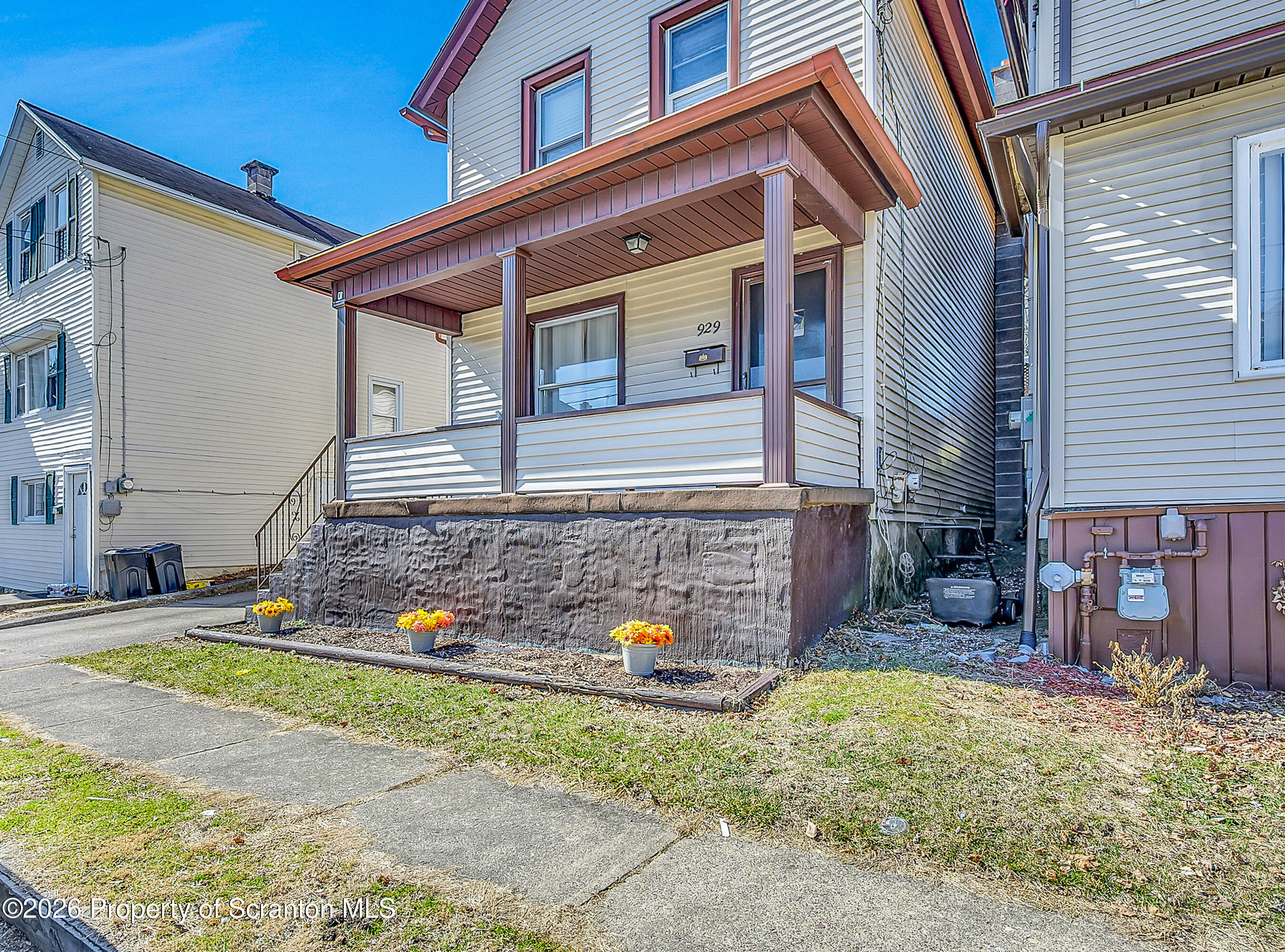 929 Ridge Avenue Scranton, PA 18510 - Photo 3 of 33 a front view of a house with garden
