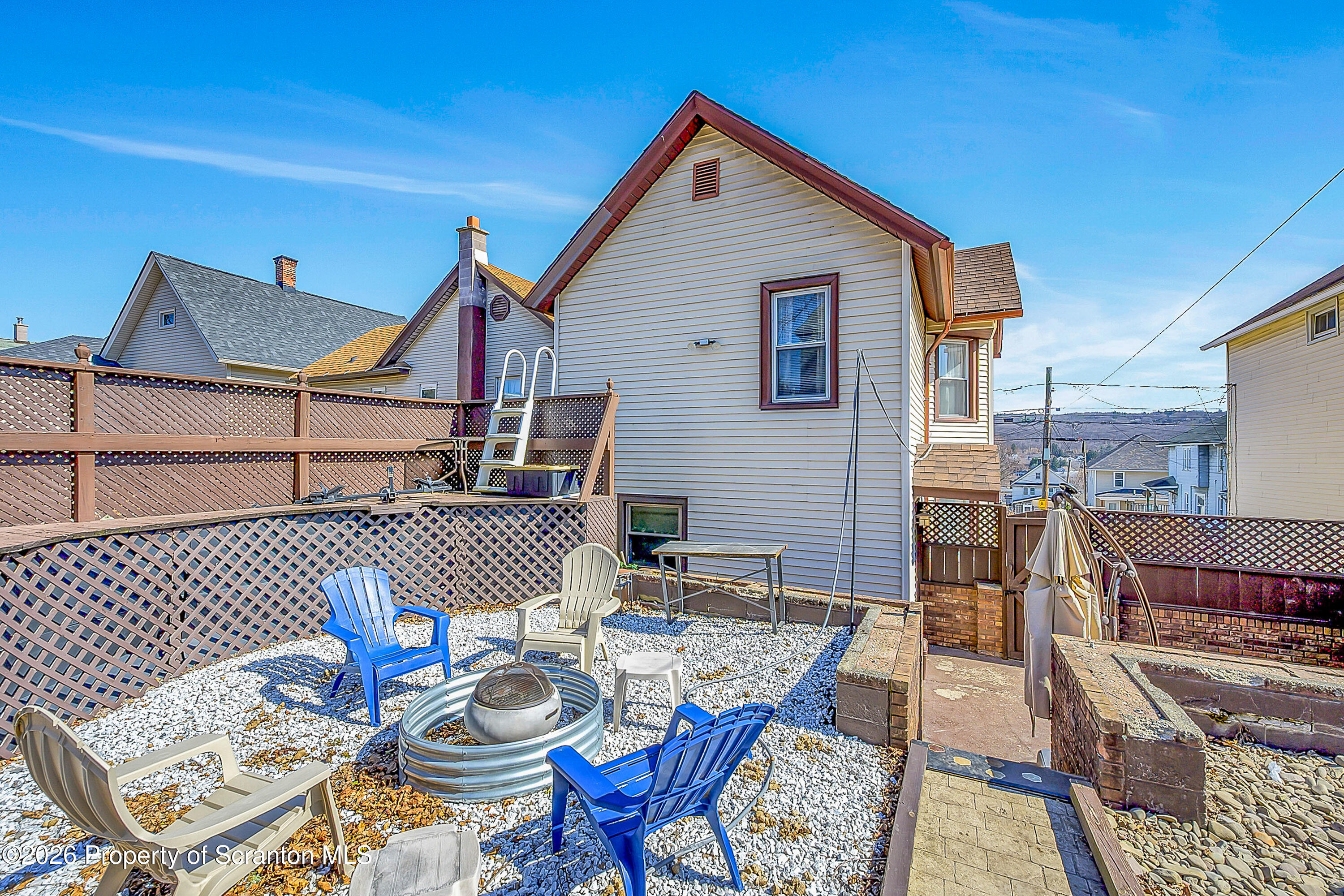 929 Ridge Avenue Scranton, PA 18510 - Photo 5 of 33 a view of a patio with a table and chairs