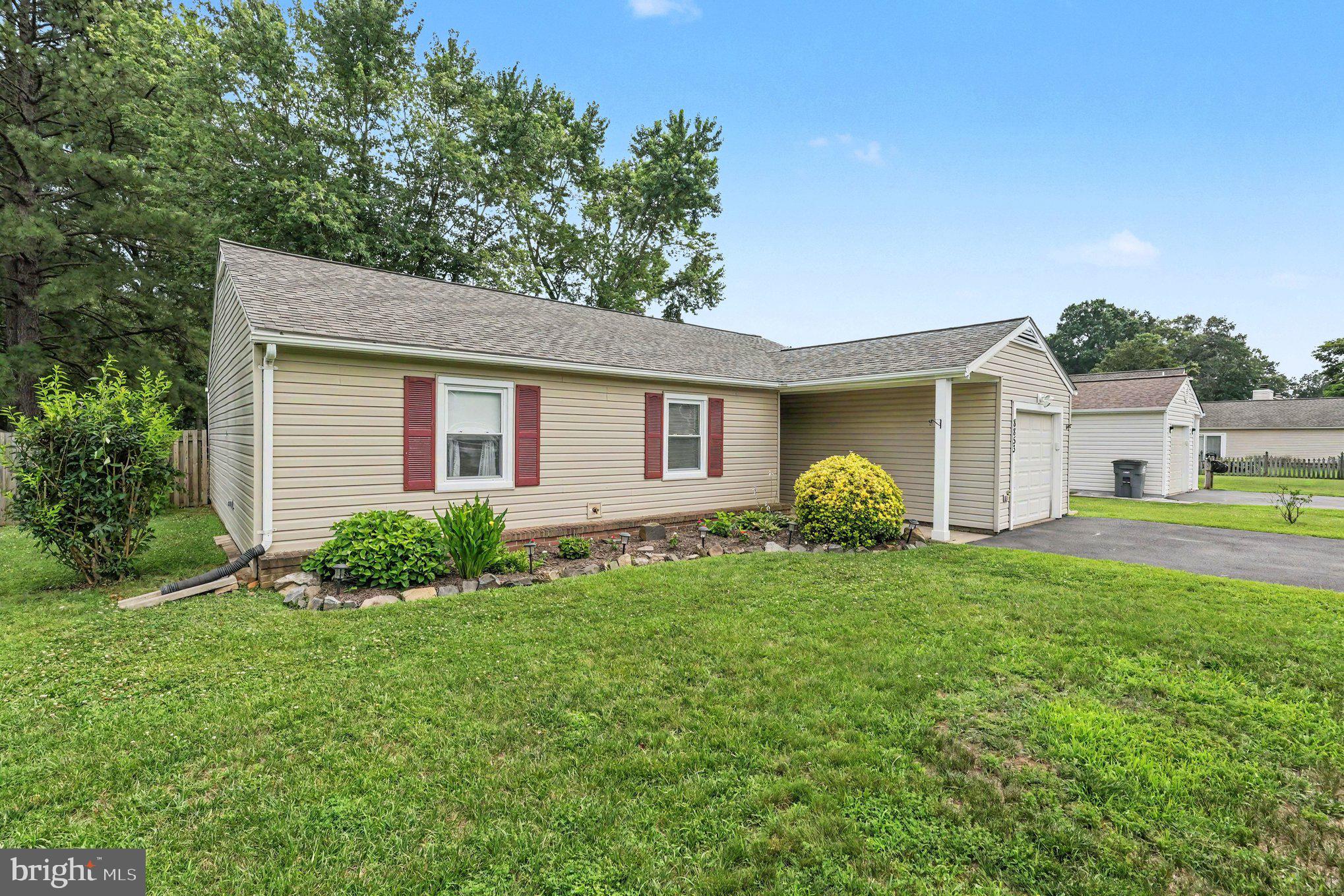 8853 Olde Mill Run Road Manassas, VA 20110 - Photo 29 of 29 Charming home with lush greenery.