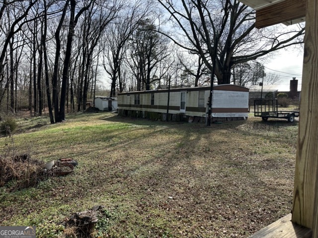 581-603 Ila Road Commerce, GA 30529 - Photo 10 of 10 a view of a yard with trees