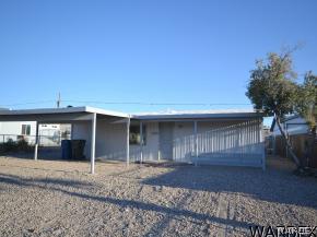 1726 Ramar Road Bullhead City, AZ 86442 - Photo 16 of 20 a view of a house with a yard