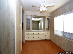 1726 Ramar Road Bullhead City, AZ 86442 - Photo 3 of 20 a view of a hallway with a chandelier