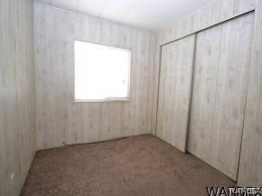 1726 Ramar Road Bullhead City, AZ 86442 - Photo 8 of 20 a view of an empty room with a window