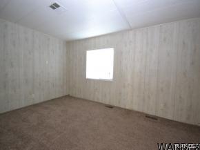 1726 Ramar Road Bullhead City, AZ 86442 - Photo 10 of 20 a view of an empty room and a window