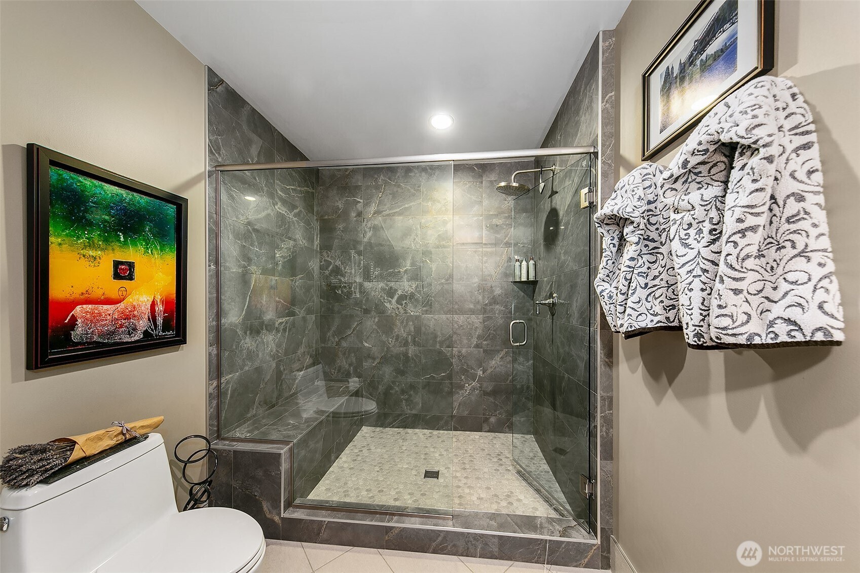 1920 4th Avenue, Unit 2802 Seattle, WA 98101 - Photo 24 of 40 a bathroom with a toilet and a shower